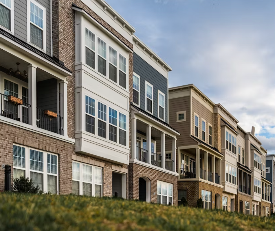 Modern townhomes - 3 story with lots of windows, balcony, and walkout first floor.